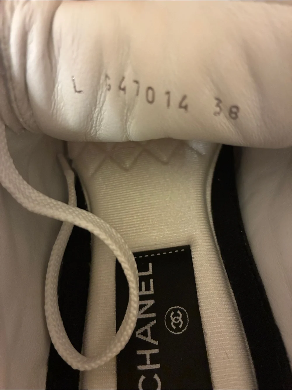 CHANEL Light Pink Quilted Lace-Up Sneakers